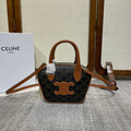 TOP HANDLE BAG 20 IN BLACK TRIOMPHE CANVAS AND BROWN CALFSKIN