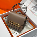HM ROULIS 18 MINI BAG IN DARK BROWN CALFSKIN GOLD-TONE HARDWARE